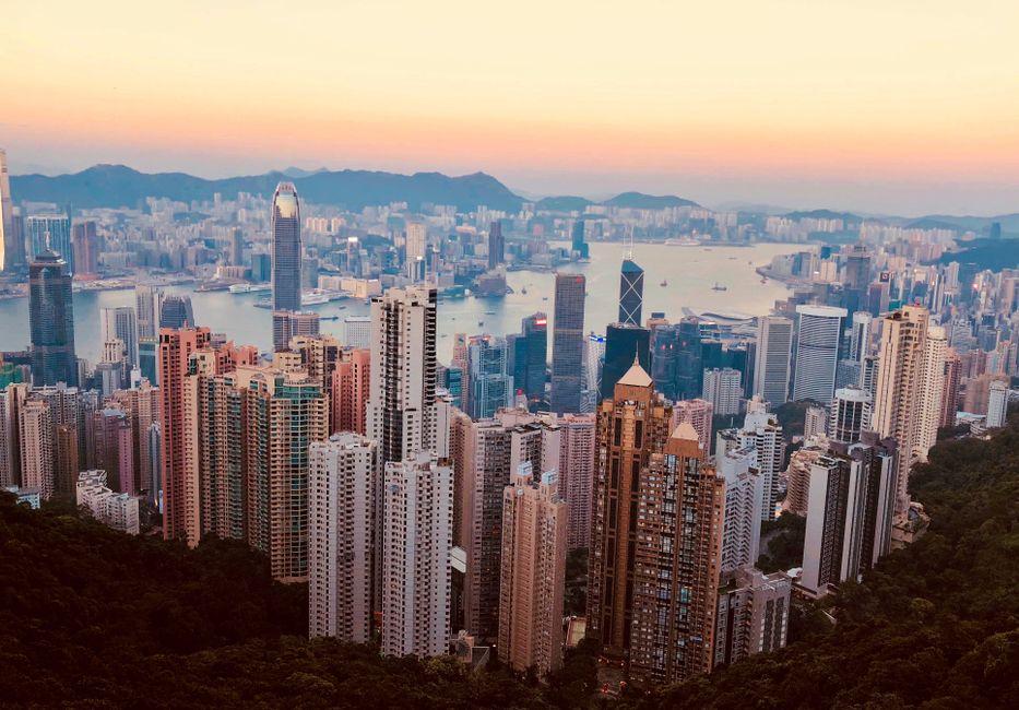 Breathtaking Kowloon skyline with skyscrapers and harbor at sunset, showcasing Hong Kong's urban beauty, Huizhou,...