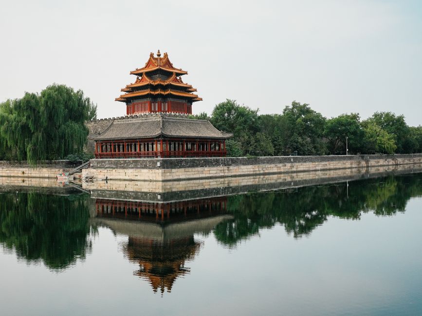 A scenic view of the iconic corner tower of the Forbidden City with its reflection in the moat, Huizhou, Guangdong