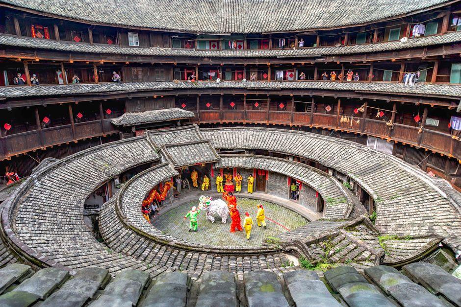 Colorful Lion Dance in Huizhou Tulou, showcasing Chinese culture.