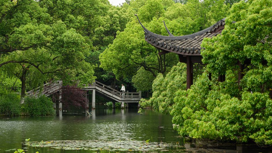 Tranquil Huizhou West Lake with traditional pavilion and bridge, Guangdong, China