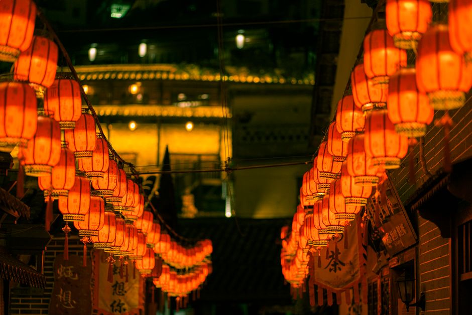 Authentic Huizhou Tulou courtyard decorated with red lanterns, showcasing traditional Chinese archit — Huizhou, Guangdong, China