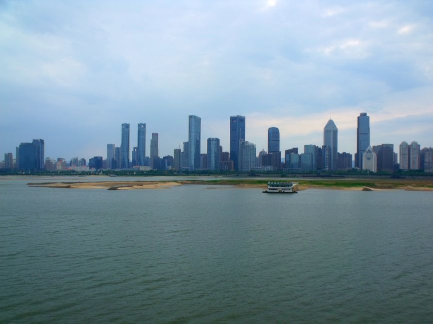 Panoramic view of Nanchang's skyline across the harbor with modern skyscrapers and river. — Huizhou, Guangdong, China